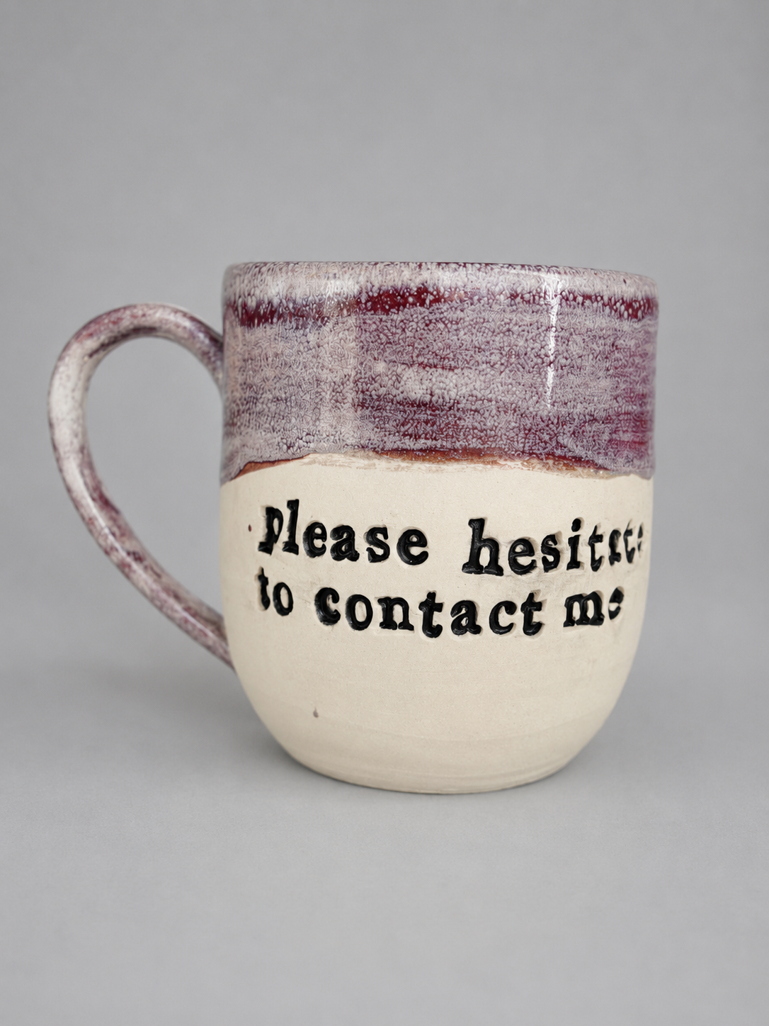 Please hesitate to contact me mug