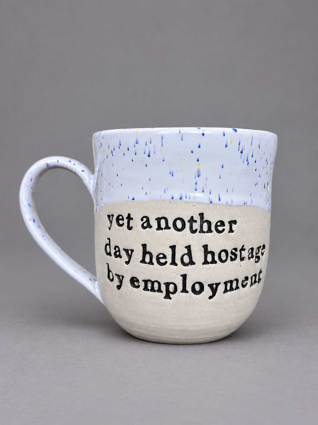 Another day held hostage by employment mug
