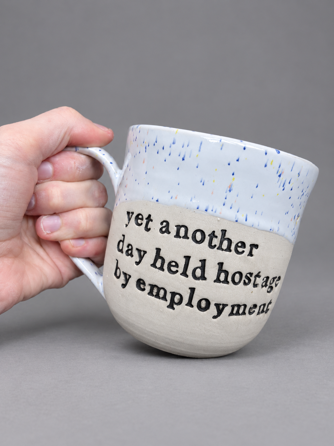 Another day held hostage by employment mug