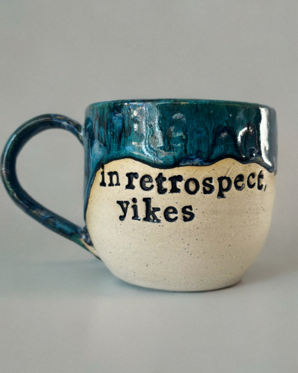 In retrospect, yikes mug