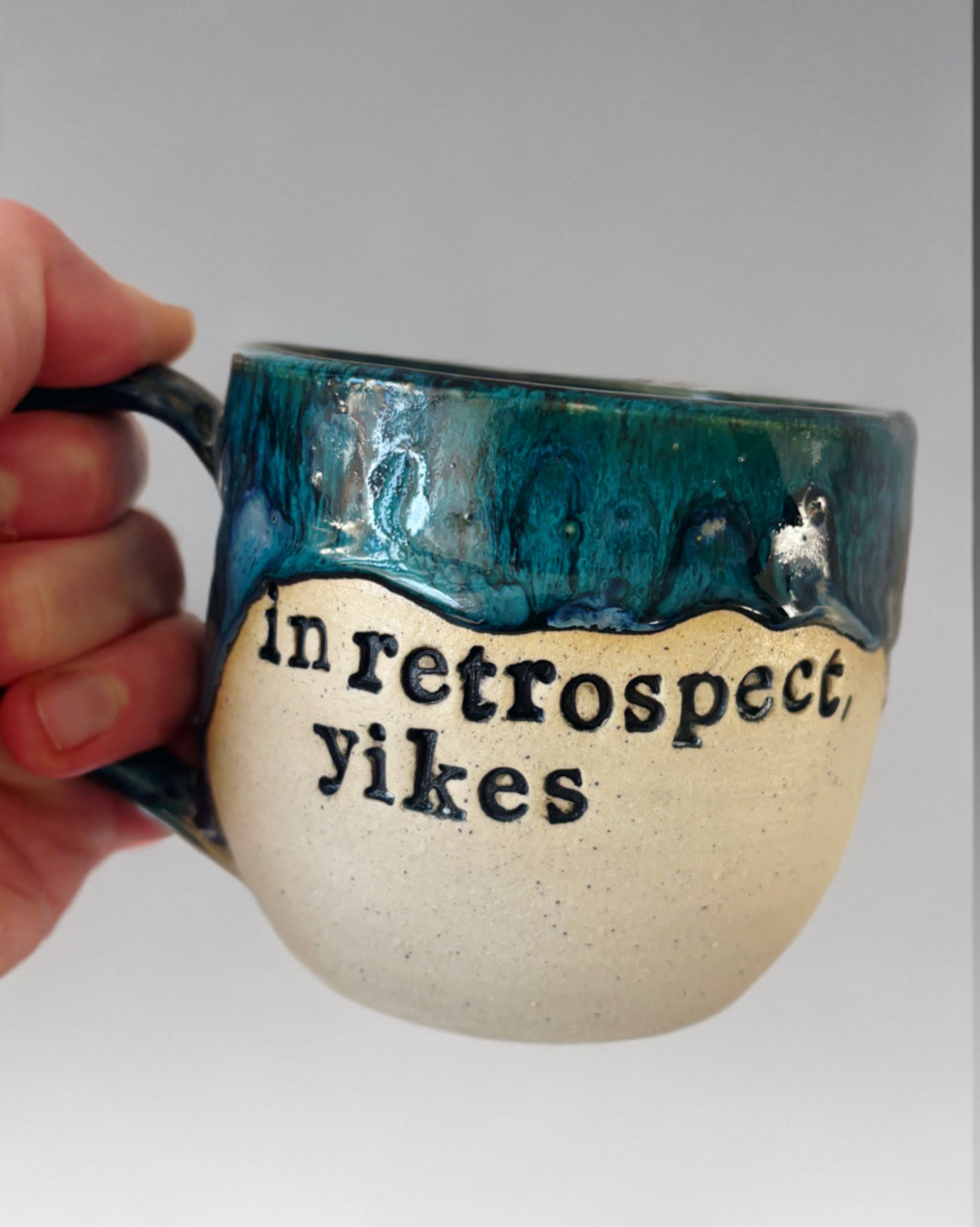 In retrospect, yikes mug