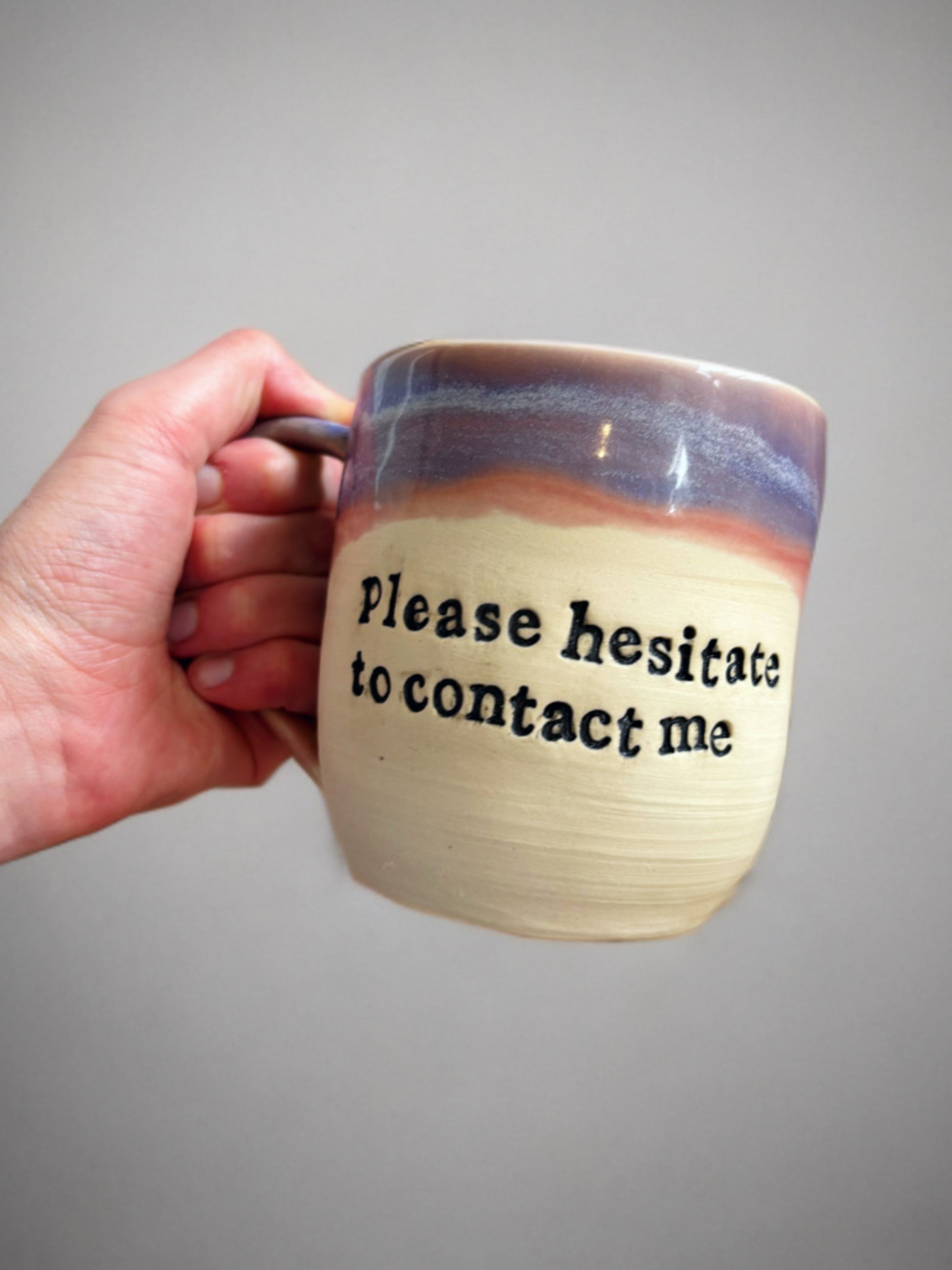 Please hesitate to contact me mug