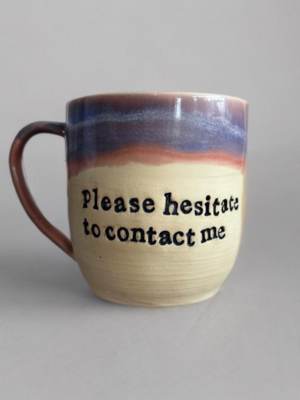 Please hesitate to contact me mug