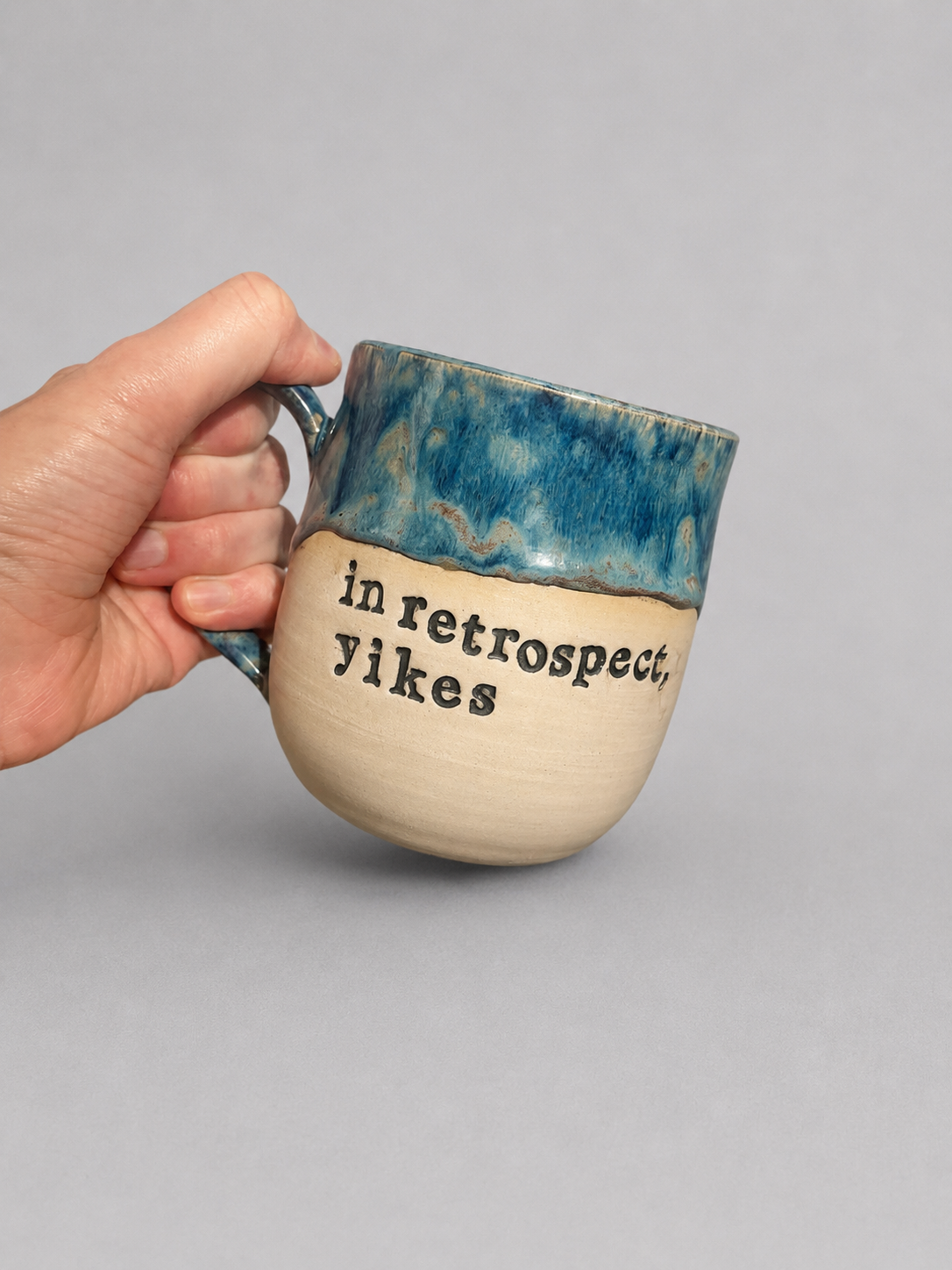 In retrospect, yikes mug