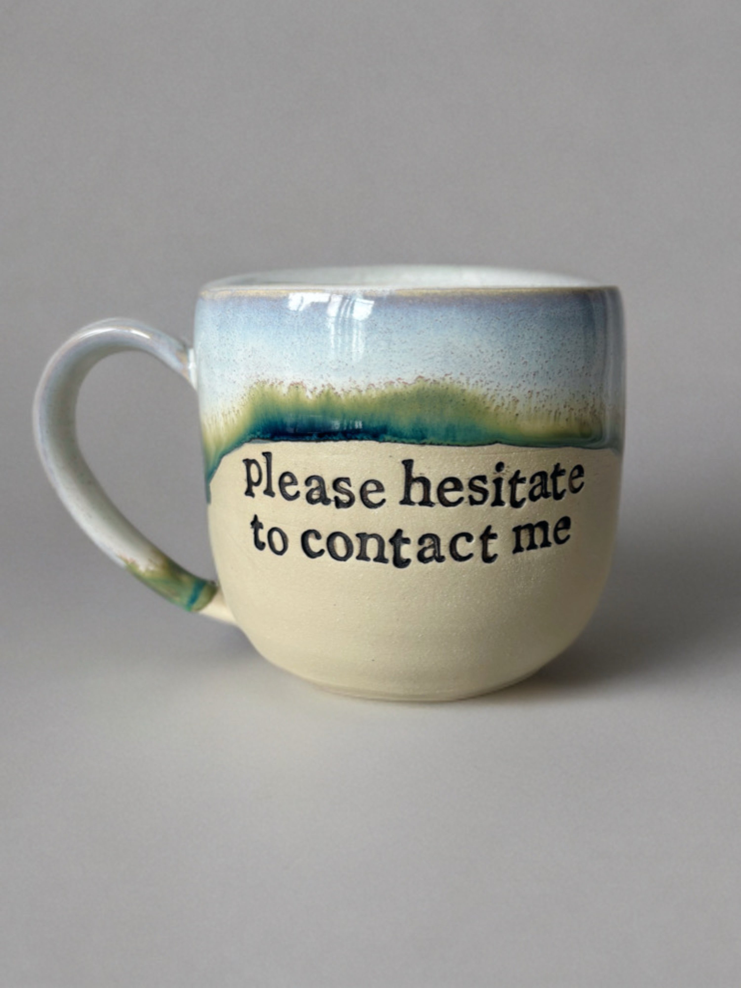 Please hesitate to contact me mug