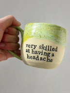 Very skilled at having a headache mug